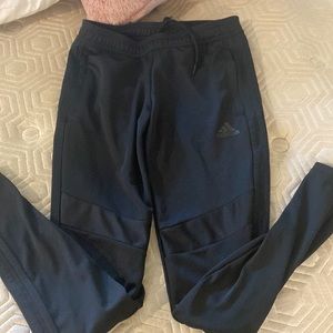 Black adidas pants size xs but can fit a small as well.
